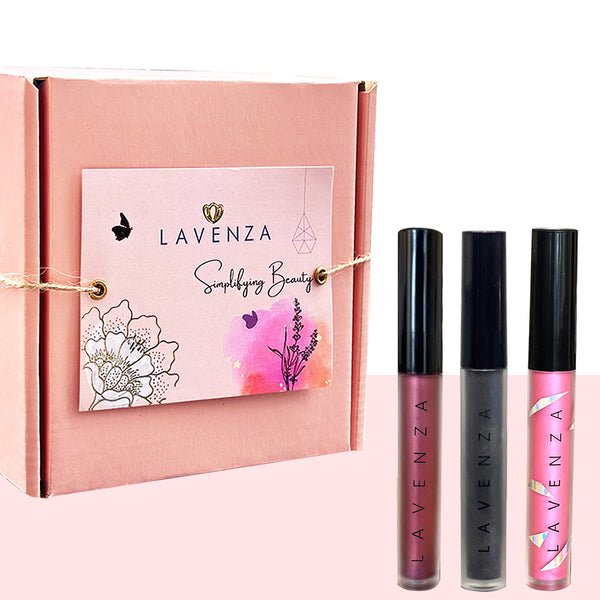 A set of three dual shaded water proof smudge proof liquid eyeshadows in Golden pink, Smokey Grey black, and Holographic purple shades of the brand name 'Lavenza Naturals' displayed.
