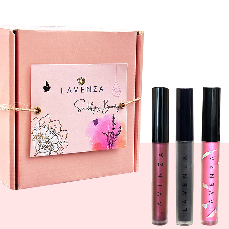 A set of three dual shaded water proof smudge proof liquid eyeshadows in Golden pink, Smokey Grey black, and Holographic purple shades of the brand name 'Lavenza Naturals' displayed.